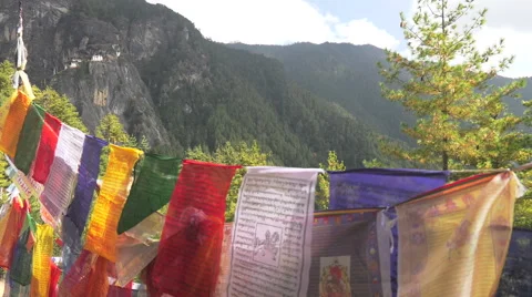 Tigers Nest Monastery with Prayer Flags foreground Stock Footage 63815682