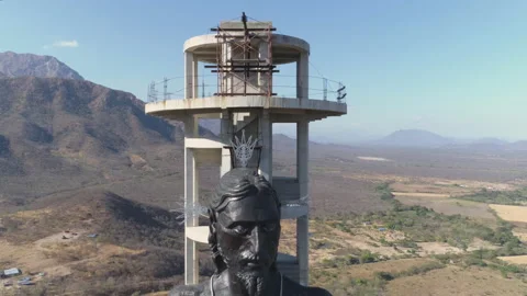 Tight aerial cranes down on the Ecce Home statue by Valledupar, Colombia Stock-Footage 238874731