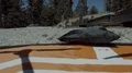 tight aerial drone launch take off from landing pad at mountain top HD Footage