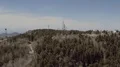 tight aerial high approach to MLO infrared observatory and USAF radar dome HD Footage