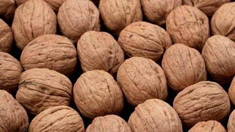 Tight Close Up Rotating Whole Walnuts Macro Texture Stockbeeldmateriaal 332528427