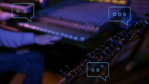 Tight closeup starting on right hand turning knobs, curly-haired operator moving Stock Footage 332981556