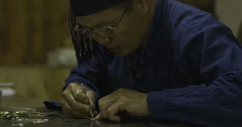Tight mid shot, craftsman on table Stock Footage 141358223