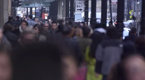 Tight shot of Chicago pedestrians downtown. Faces blurred. Stock Footage