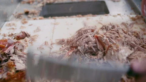 Tight shot of chopping pulled pork BBQ Stock Footage 195305481