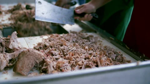 Tight shot of chopping pulled pork BBQ Stock Footage 195307012