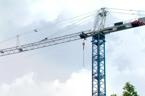 Tight Shot of an Elevated Construction Crane Stock Footage 372664