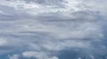 tight shot large thunderhead buildup over mountain range and rain time lapse Vídeos en HD