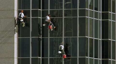 Tight shot of three window washers on li... | Stock Video | Pond5