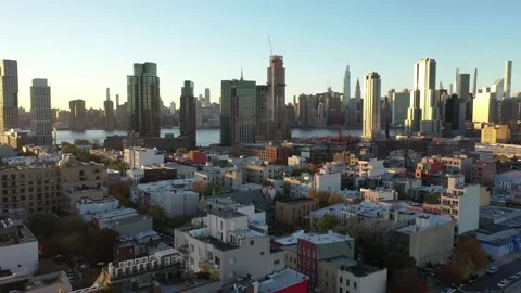 A tight street grid under long afternoon shadows in Greenpoint, Brooklyn Stock Footage 164974026