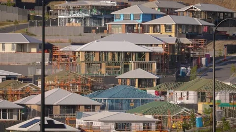 Tight view of houses being built in the upper section of the SkyRidge Stock Footage 346382235
