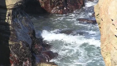 Tight waves and rocks Stock Footage 77458786