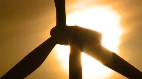 Tight of Wind Turbine at Sunset Stock Footage 32935876