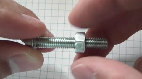 Tighten the nut with fingers Stock Footage 53358012