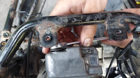 Tighten the nuts with a wrench Stockbeeldmateriaal 292395328