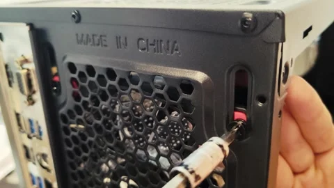 Tighten screw in computer case made in china, Gamer PC Build assembly Video stock 302346834