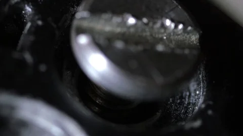 Tighten screw with screwdriver macro 4k Video stock 72415677