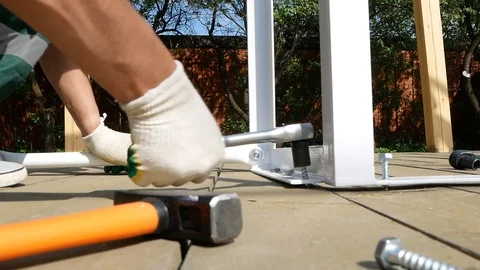 Tighten the screw with the tool Stock Footage 101663106