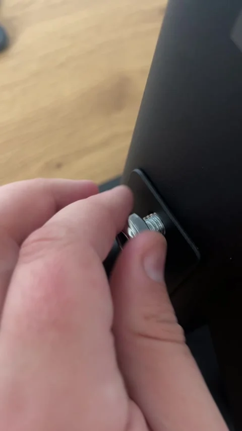 Tightening Bolt on Pull-Up Bar Assembly Stock Footage 311020341