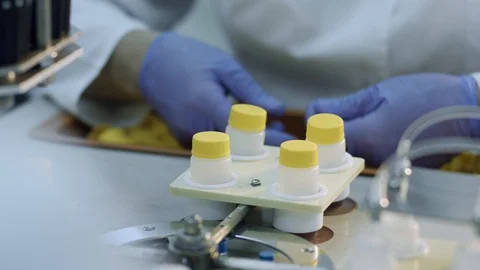 Tightening the caps on the conveyor Stock Footage 101015028