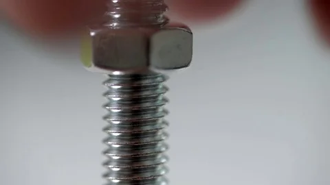 Tightening a nut to a bolt Video stock 71138467