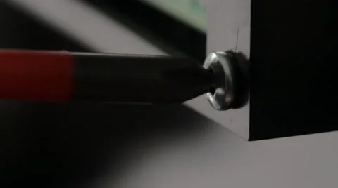 Tightening a screw Vídeos de archivo 60419012