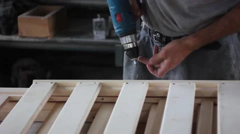 Tightening the screws in the Board Stock Footage 66445915