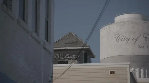 Tighter Close Up and Pan (Left to Right) to Cleveland, Ohio Water Tower Stock Footage 89945203
