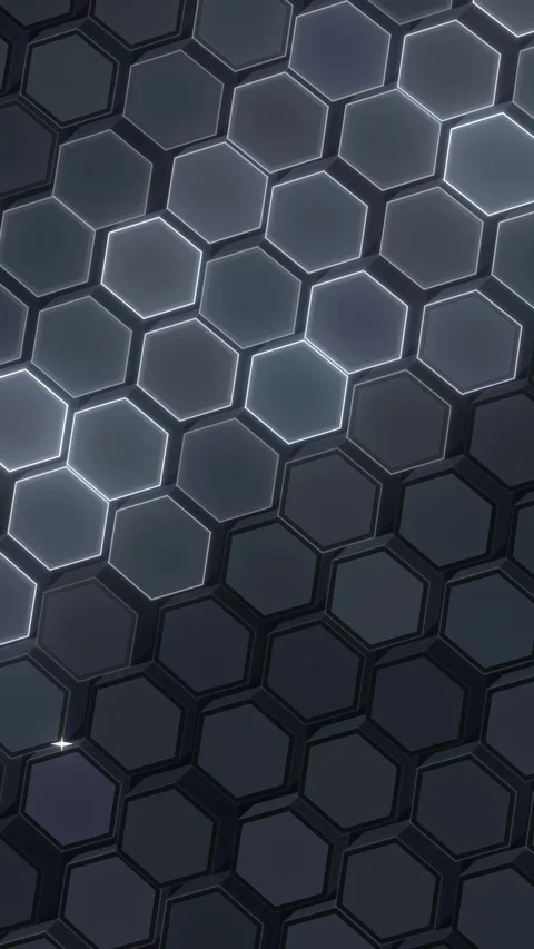 A tightly packed field of dark hexagonal cells fills the frame, with cool b.. Stock Footage 348763525