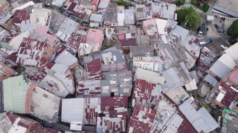 Tightly packed rooftops in an aerial view of Comuna 13, Medellin, Colombia Stock Footage 274348449