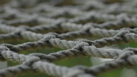 Tightly woven rope pattern outdoors, close-up shot with a soft focus Stock Footage 286713494