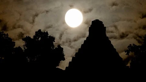 Tikal, Mayan Pyramid by Night With Full Moon and Dark Silhouette of Temple Stock Footage 125566534