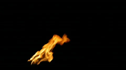 Tiki torch flame at night Stock Footage