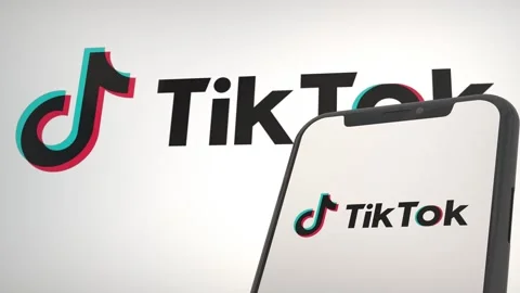 TikTok app logo in mobile display screen and background editorial Video stock 255171435