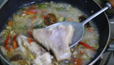 Tilapia soup Stock Footage 222990575