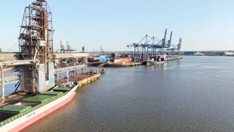 Tilbury docks UK ship unloading containers Stock Footage 331748285