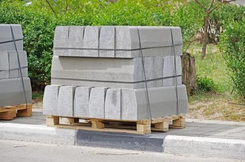 Tile blocks on pallets lie next to each other Stock Photos