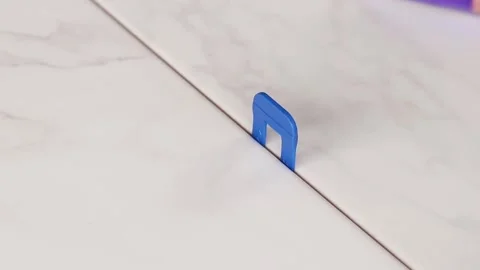 Tile leveling system in the process of work 스톡 동영상 339092295