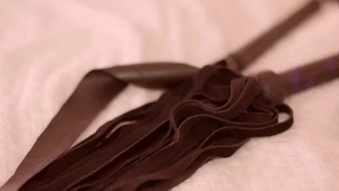 The tile object lies on a white simple bed Stock-Footage 294770321