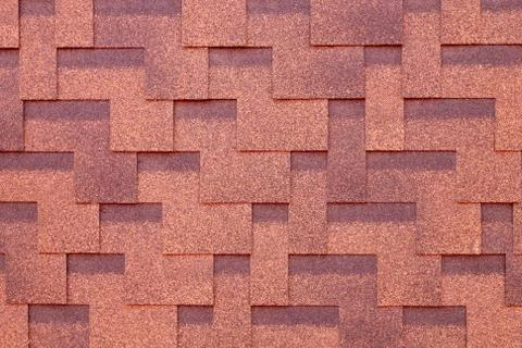 Tile on the roof.Background of shingles.Creative background. Stock Photos