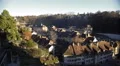 Tile roofs of cozy houses, panorama of old European city on a sunny day 4k or 4k+ Resolution