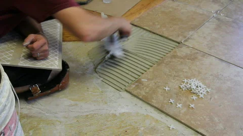 Tile setter, remodel kitchen, i Stock Footage