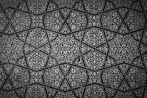 Tiled background with oriental ornaments . Stock Photos