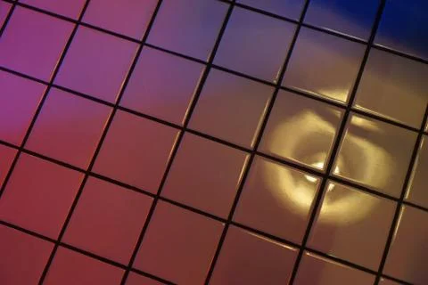 Tiled floors reflect light in the fun party. Stock Photos