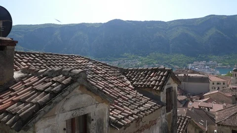 Tiled roofs of the old city Stock Footage 90357079