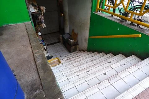 Tiled Staircase Leading Down to a Small Market Stall at Pasar PSPT Jakarta Stock Photos