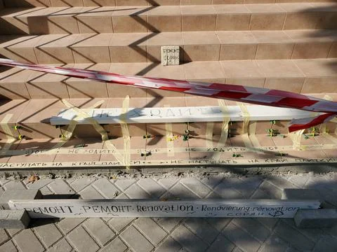 Tiled steps while renovation with precaution text - do not step, renovation Stock Photos