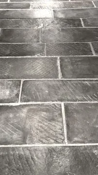 Tiled stone flooring elevates interior design, combining smooth texture with Stock Photos