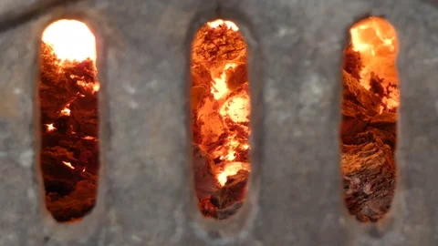 Tiled Stove Closed - Burning Coals of Fireplace - View Through Shutter Stock Footage 85217404