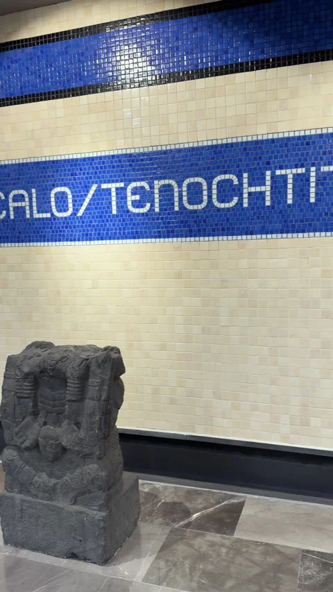 Tiled Wall and Stone Sculpture at Renovated Zocalo/Tenochtitlan Metro Station Stock Footage 345718406